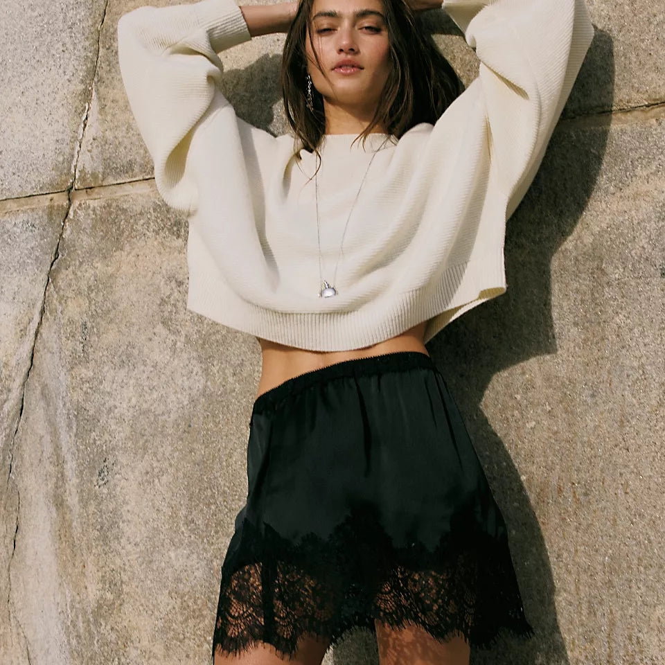 FREE PEOPLE MEET IN THE MIDDLE SLIP SKIRT - BLACK